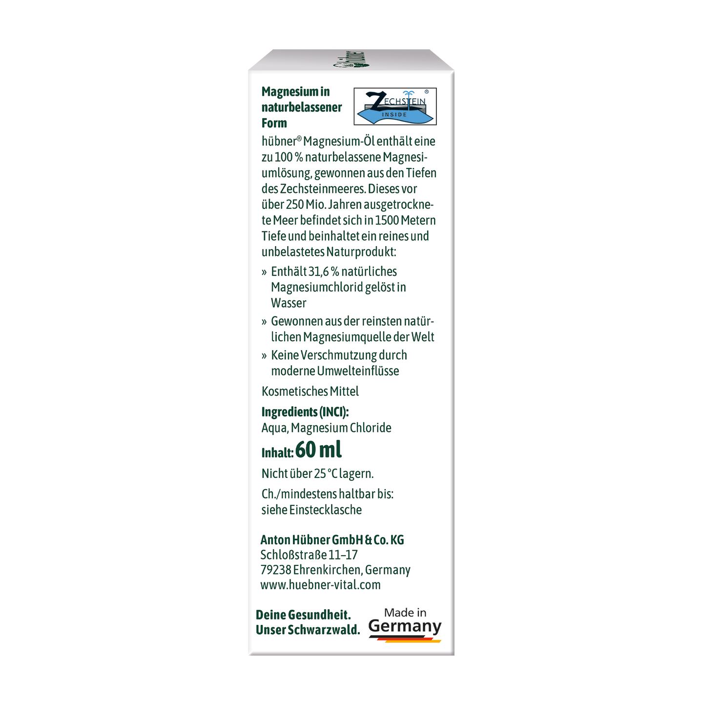 Eine weiße Schachtel mit der Aufschrift „Magnesium-Öl“ mit deutschem Text und zwei Qualitätssiegeln an der Unterseite, auf schwarzem Hintergrund.