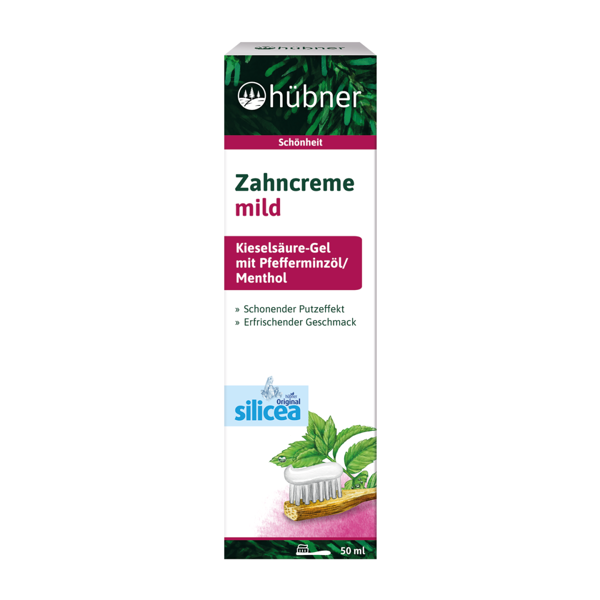 Schachtel mit Hübner Zahncreme Mild mit Kieselgel, Pfefferminzöl, Menthol und dem Bild einer Zahnbürste mit grünen Blättern.